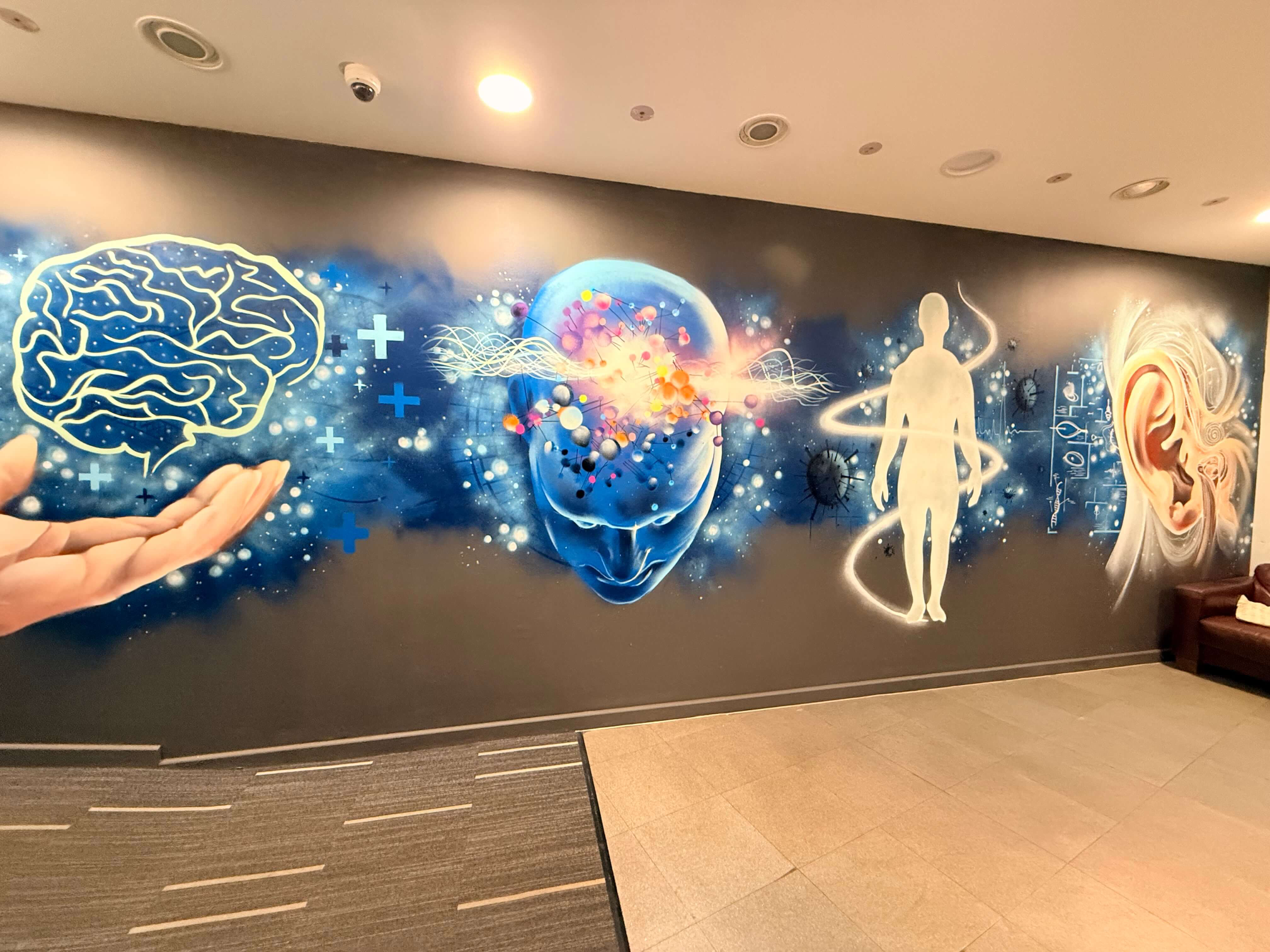 Wellness mural wall inside Elements Health Hub