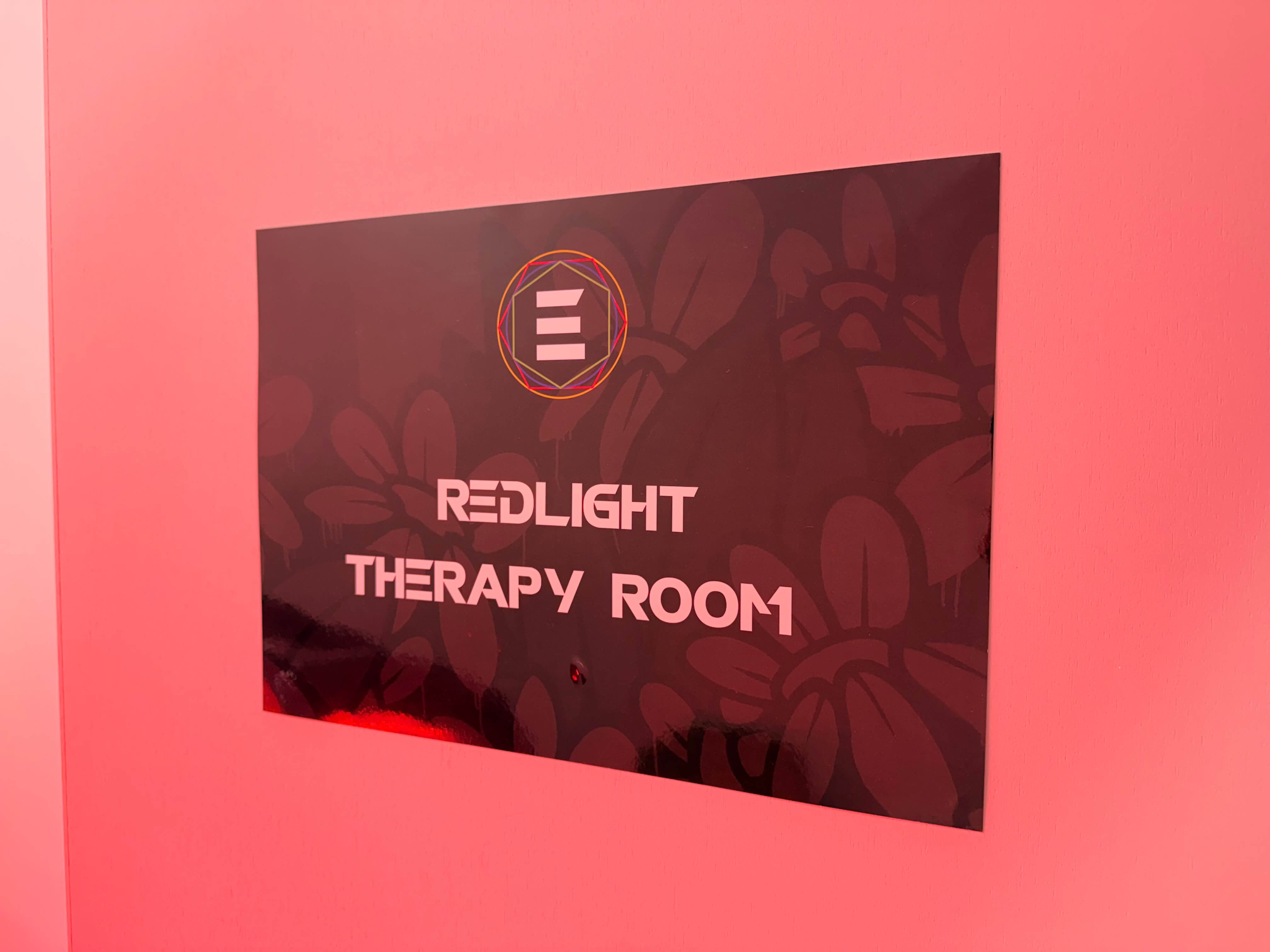 Red light therapy sign inside Elements Health Hub