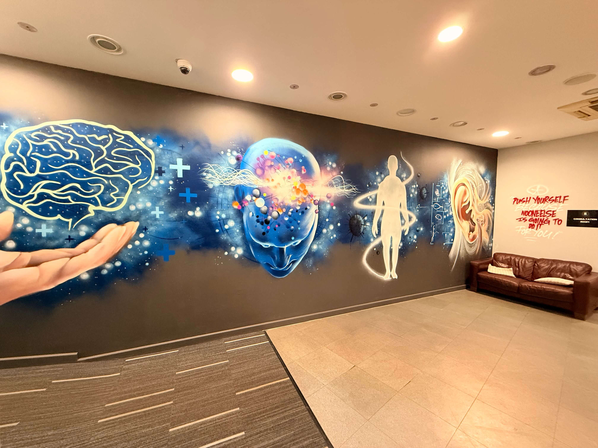 Angled view of the wellness mural wall